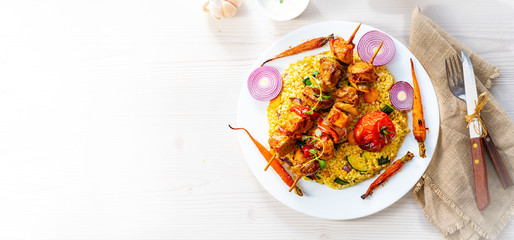 Shish kebabs with vegetables and bulgur