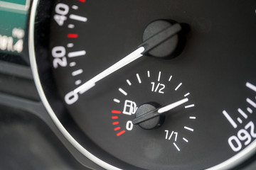 Close-up of fuel gauge on car dashboard