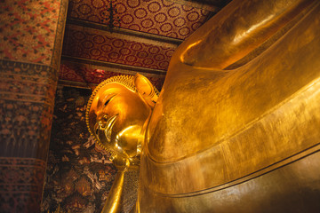 Reclining buddha statue at temple in Bangkok, Thailand