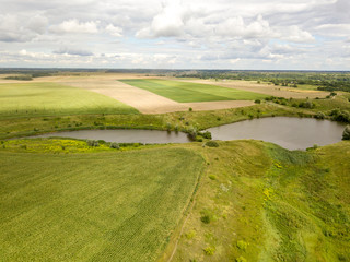 Fototapeta na wymiar Ukrainian agricultural fields, aerial drone view.