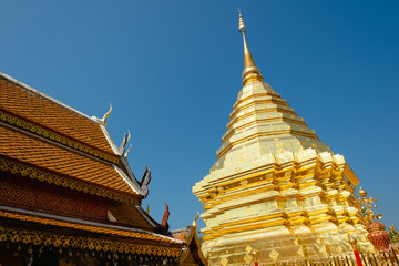 Fototapeta premium Golden spire and of temple in Chiang Mai, Thailand