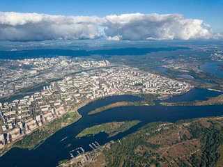 High view of the Dnieper river in Kiev. A cloud over the city.