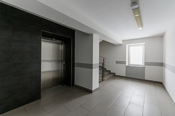 Russia, Moscow- February 15, 2020: interior room apartment modern bright cozy atmosphere. public place, house entrance. doors, walls, staircase corridors