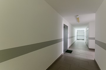 Russia, Moscow- February 15, 2020: interior room apartment modern bright cozy atmosphere. public place, house entrance. doors, walls, staircase corridors