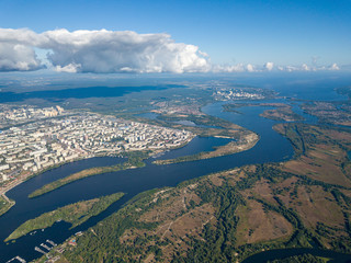 High view of the Dnieper river in Kiev. A cloud over the city.