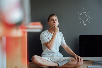 Young smiling man has an idea.Idea concept