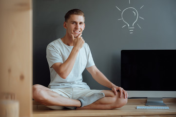 Young smiling man has an idea.Idea concept