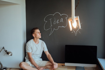 Young smiling man has an idea.Idea concept