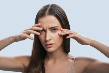 Naklejka premium Sad dispirited woman staring in front of her
