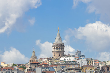 Fototapeta na wymiar Istanbul cityscape including historical Galata Tower in a cloudy day 