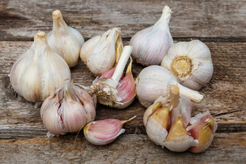 Fresh garlic on a rustic wooden table