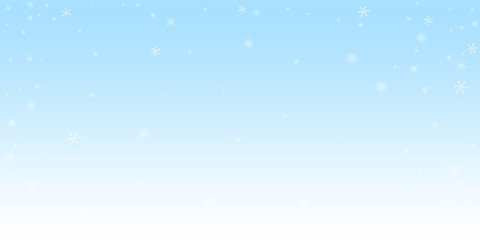 Sparse glowing snow Christmas background. Subtle f