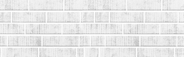 Obraz premium Panorama of Modern whitestone wall with stripes texture and seamless background