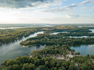 Fototapeta na wymiar Sunset over the river Dnieper in Kiev. Aerial drone view.
