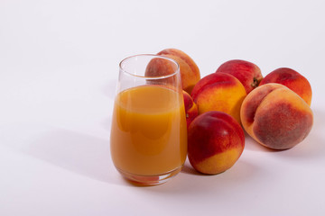 a glass of peach juice