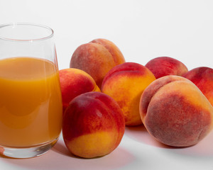 a glass of peach juice