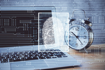 Computer on desktop in office with finger print drawing. Double exposure. Concept of business data security.