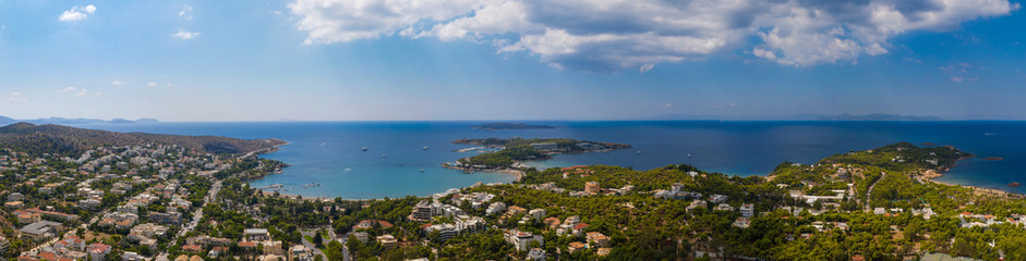 Fototapeta na wymiar Athens Greece panorama. Aerial drone view of Vouliagmeni Lemos, sunny summer day