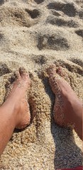 feet on the beach