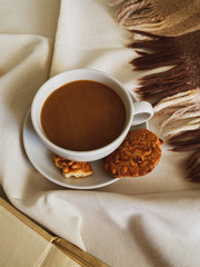 Cup of coffee and cookies in retro style