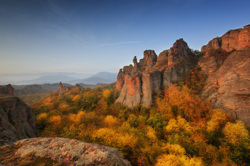 Belogradchik rocks. Magnificent morning view of the Belogradchik rocks in Bulgaria, lit by the autumn sun.