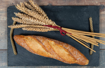 Baguette or French bread and some wheat ears