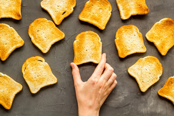 Layout of toast bread slices, food background. Overhead view