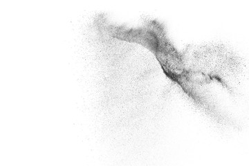 Black particles explosion isolated on white background.  Abstract dust overlay texture.