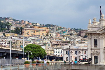 Fototapeta na wymiar Panorama of Genoa city with residential buildings in the evening, Italy