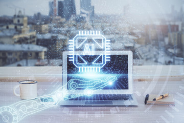 Double exposure of desktop computer and technology theme hologram. Concept of software development.