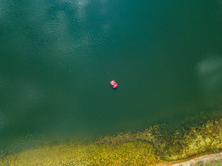 Aerial drone view. Catamaran on the lake.
