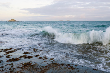 Big high tide and big waves on the Chaussée du Sillon in Saint Malo, Brittany, France
