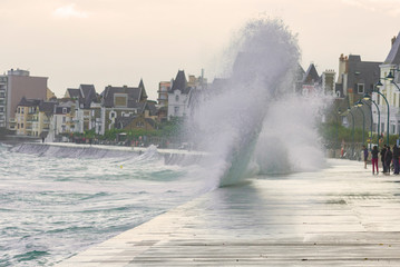 Big high tide and big waves on the Chaussée du Sillon in Saint Malo, Brittany, France