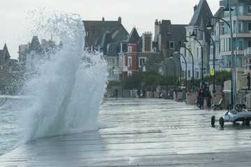 Big high tide and big waves on the Chaussée du Sillon in Saint Malo, Brittany, France