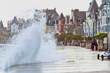 Big high tide and big waves on the Chaussée du Sillon in Saint Malo, Brittany, France