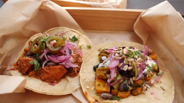 Tasty tacos and quesadilla layout food in Mexican cuisine restaurant