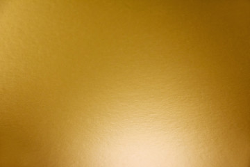 Golden light abstract background stock images. Abstract light gold metal gradient images. Shiny festive background with copy space for text