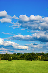 Fototapeta na wymiar Blue sky background with a tiny clouds