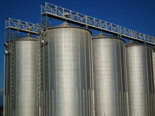 Big tanks for barley, harvested corp.