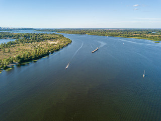 Aerial drone view. Ship on the Dnieper River in Kiev.