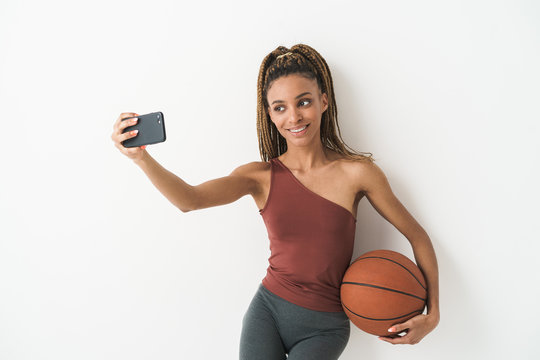 Sports Woman With Basketball Taking A Selfie By Mobile Phone