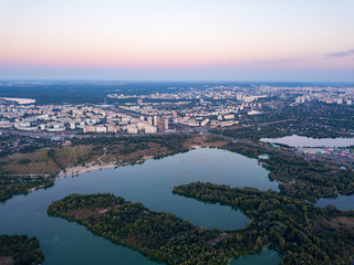 Aerial view. Dnieper river and Kiev city at dusk.