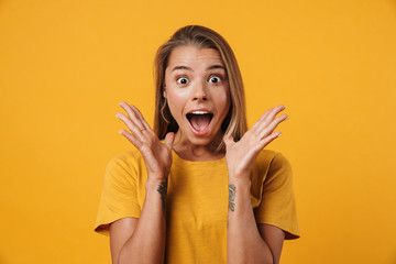 Image of blonde excited woman expressing surprise on camera