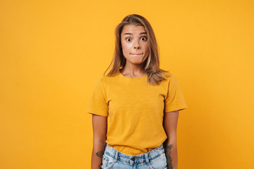 Obraz premium Image of blonde shocked woman expressing surprise on camera