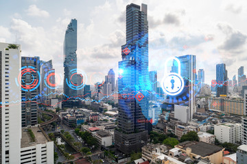 Padlock icon hologram over panorama city view of Bangkok to protect business in Asia. The concept...