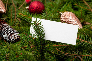 Christmas holiday mock up with fir branches. Christmas greeting card concept