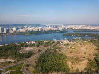 Fototapeta na wymiar Aerial drone view of the Dnieper River in Kiev. Clear sunny day.