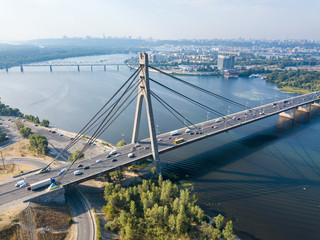 Aerial drone view. North bridge in Kiev and the Dnieper river on a clear summer morning.