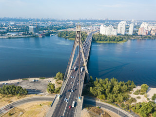 Aerial drone view. North bridge in Kiev and the Dnieper river on a clear summer morning.