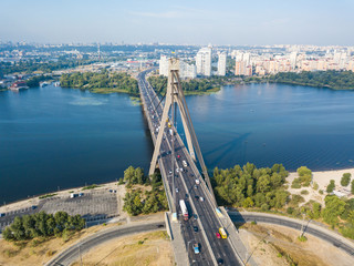 Aerial drone view. North bridge in Kiev and the Dnieper river on a clear summer morning.